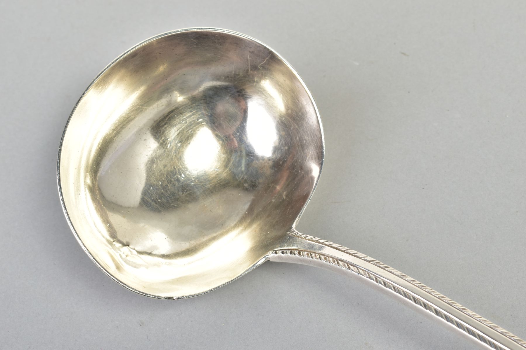 A VICTORIAN SILVER SOUP LADLE, of plain design with a feathered detail to the handle with an - Image 5 of 6