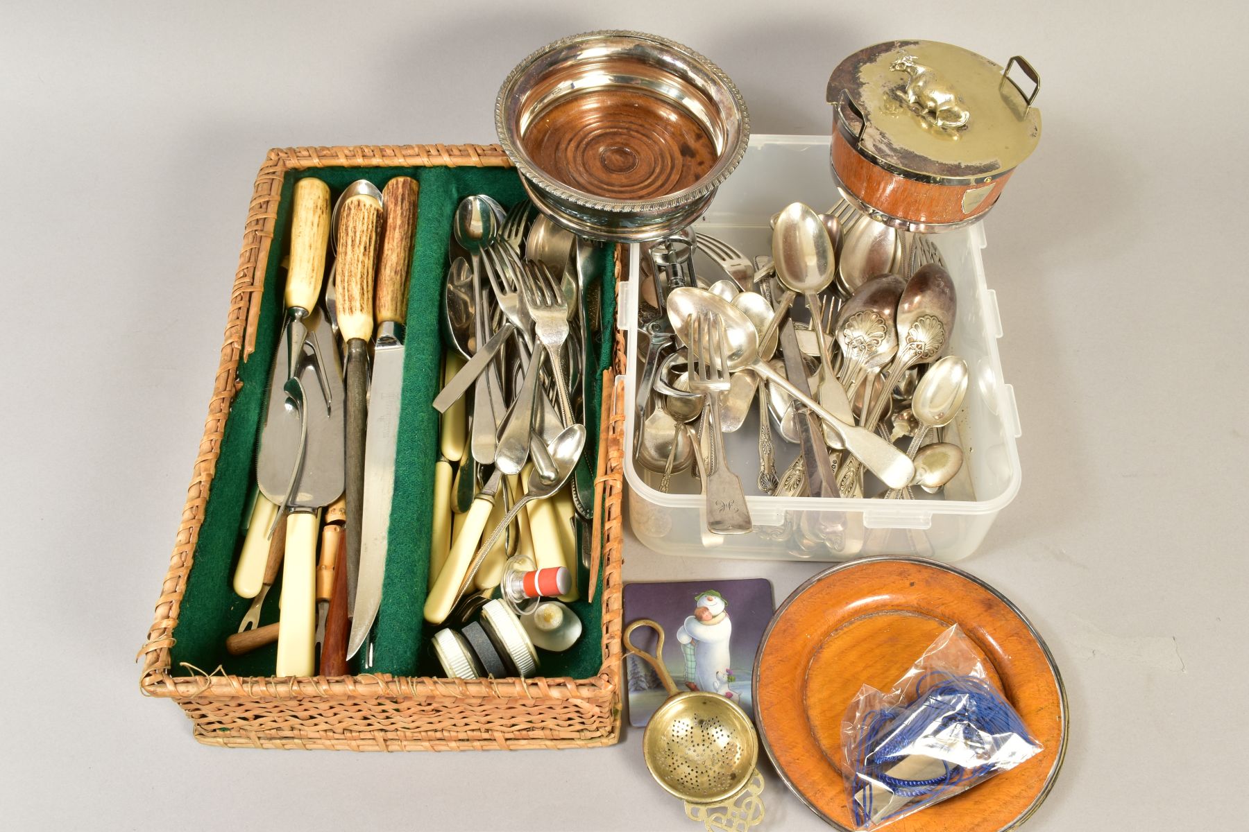 A BOX OF SILVER PLATE, include treen EPNS butter dish and cover on stand, a quantity of loose