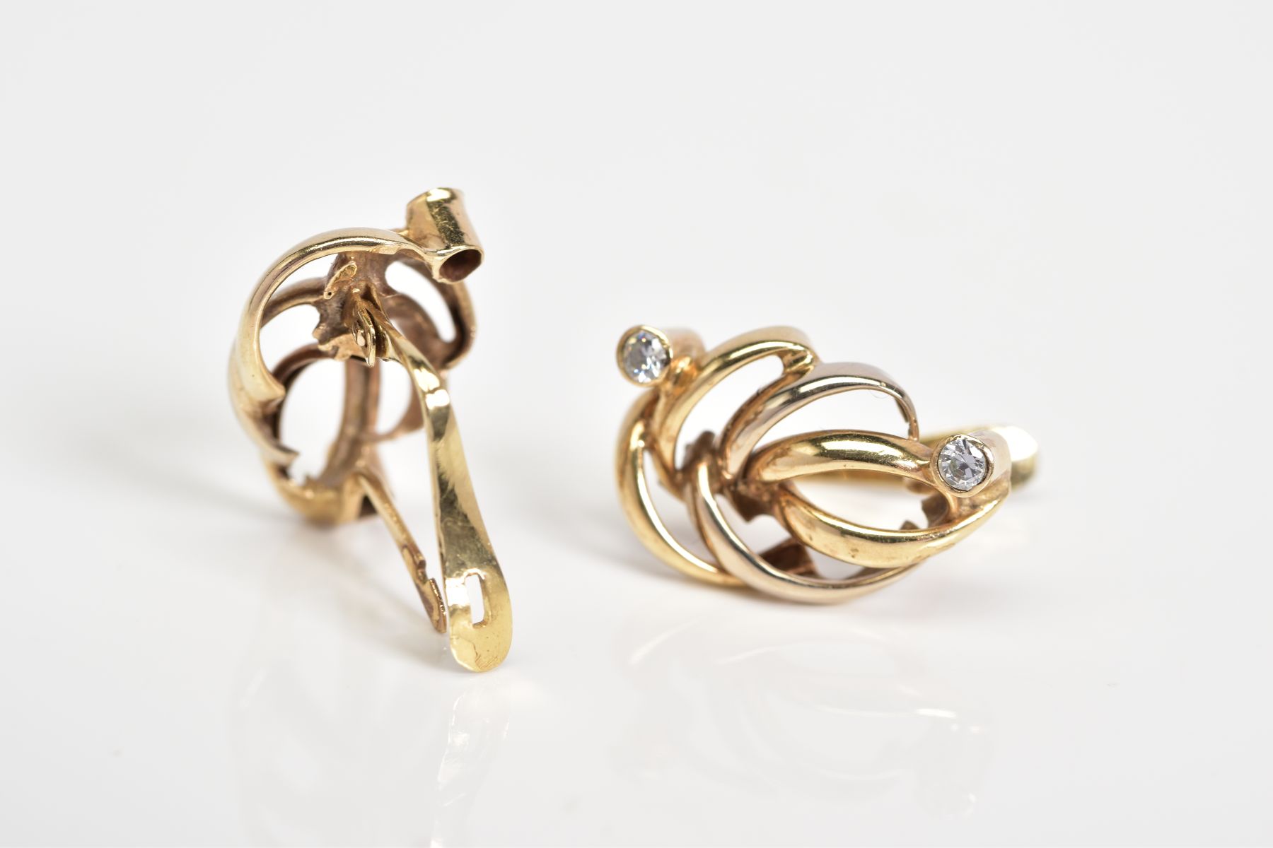 A PAIR OF OPEN WORK EARRINGS, each yellow metal earring in the form of a leaf set with parallel - Image 3 of 3