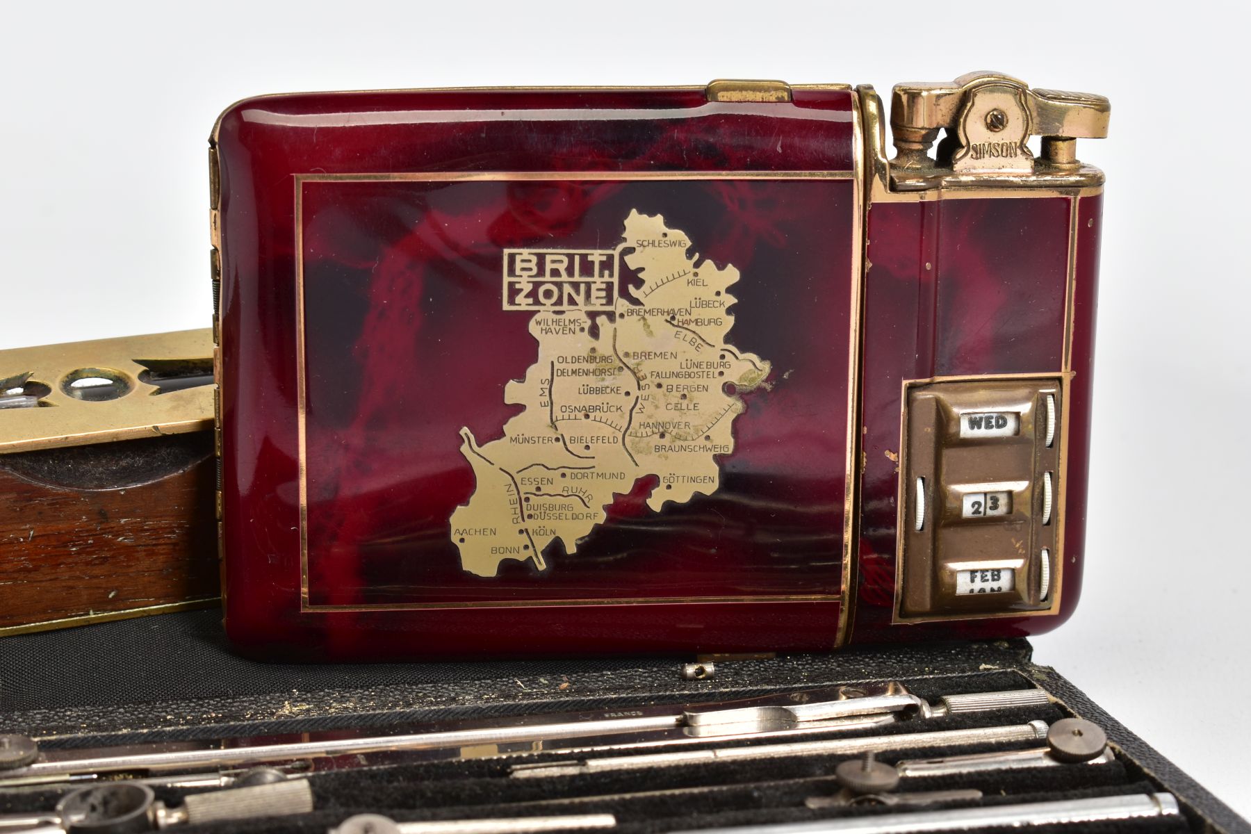 A SELECTION OF ITEMS, to include a red enamel cigarette case with attached lighter and calendar to - Image 2 of 3