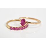 TWO 9CT GOLD RUBY RINGS, the first designed with a single oval cut ruby to the plain polished