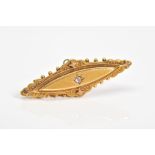 A VICTORIAN DIAMOND SET MEMORIAL BROOCH, of lozenge shape, set with a single old cut diamond