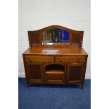 AN EARLY TO MID 20TH CENTURY OAK MIRROR BACK SIDEBOARD with two drawers, width 135cm x depth 46cm