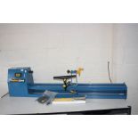 A WORKZONE 400W WOOD TURNING LATHE with manual, backing plate and three chisels (PAT pass and