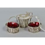A VICTORIAN EPNS CONDIMENT SET comprising of a lidded mustard pot with glass lining and pair of