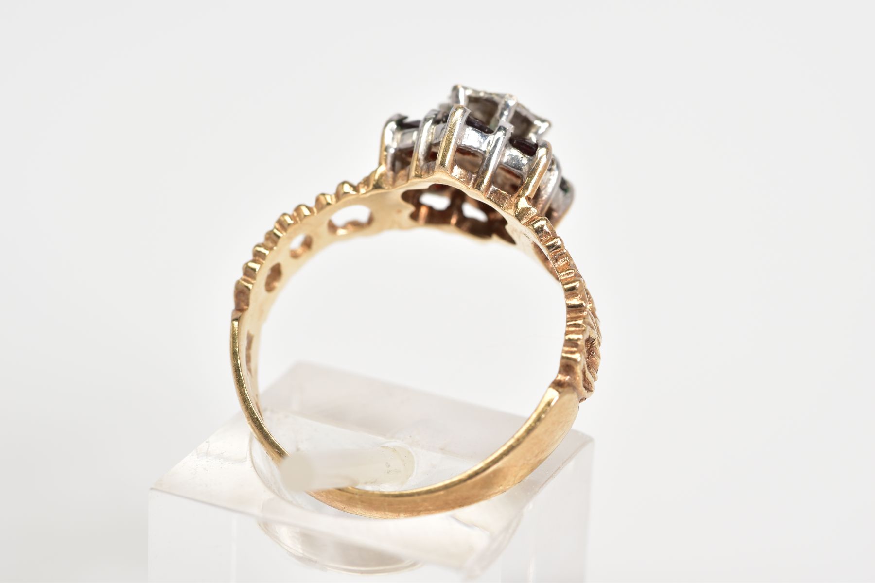 A 9CT GOLD CLUSTER RING, of tiered design set with a central single cut diamond, with a circular cut - Image 3 of 3