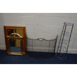 A 20TH CENTURY BRASS NURSERY FENDER, together with a pine wall mirror, gilt wall mirror and a chrome