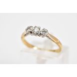 A THREE STONE DIAMOND RING, set with three round brilliant cut diamonds within a rub over mount to