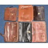 SIX LEATHER BAGS to include a shoulder bag, music bags/document bag, mostly in need of restoration