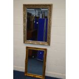 A MODERN FOLIATE SILVERED BEVELLED EDGE WALL MIRROR, 110cm x80cm and a gilt framed wall mirror (2)