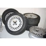 A SET OF FIVE 5 1/2'' X 13'' ALLOY WHEELS, four with 185/55R13 tyres, three Dunlop and one Pirelli