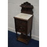 AN EARLY 20TH CENTURY FRENCH CARVED OAK WHITE MARBLE TOPPED POT CUPBOARD, with a raised back, single