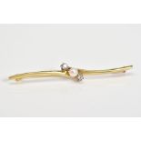 A DIAMOND AND PEARL BAR BROOCH, of crossover style set with a single central cultured pearl