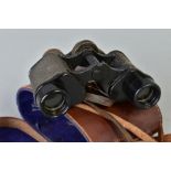 A PAIR OF MILITARY STYLE BINOCULARS IN BROWN LEATHER CASE, branding has an anchor with initial D and