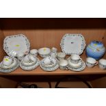 AN EARLY 20TH CENTURY SHELLEY CHINA TEA SET, printed and tinted floral and geometric design,