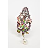 A PLIQUE A JOUR BROOCH, in the form of a lady with red, yellow and green enamel flowers, with a