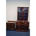 AN EDWARDIAN MAHOGANY GLAZED DOUBLE DOOR BOOKCASE with two drawers, width 121cm x depth 51cm x