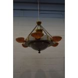 A SET OF THREE ART DECO THEATRE FOYER CHANDELIERS, of a hexagonal form, with six peach resin shell