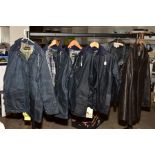 FOUR NAVY BLUE WAX JACKETS by John Partridge with label attached, size 86cm, 97cm and two being