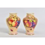 A PAIR OF SMALL ROYAL WORCESTER FRUIT PAINTED BALUSTER VASES, signed R.Price, shape No, 2491/4,
