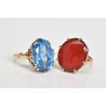 TWO LARGE GEMSTONE RINGS, the first designed with a large oval cut carnelian panel within an eight