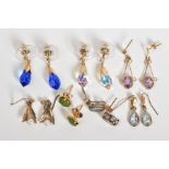 SEVEN PAIRS OF EARRINGS, to include a pair of yellow metal open work drop earrings set with oval