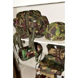 A GROUP OF MILITARY/CAMOFLAGE CLOTHING AND ACCESSORIES, to include ruck sack, sleeping bag, torch,