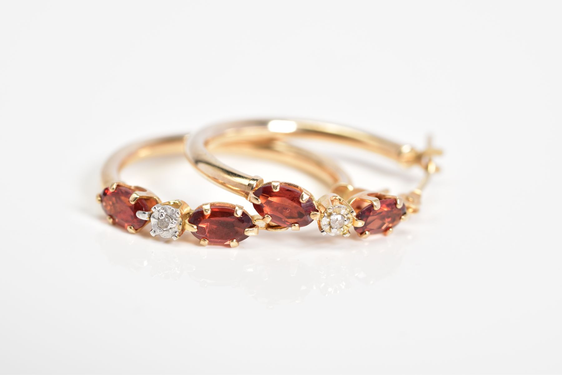 A PAIR OF TOURMALINE AND DIAMOND HOOP EARRINGS, each set with two oval cut reddish/brown tourmalines - Image 2 of 3