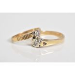 TWO 9CT GOLD SINGLE STONE DIAMOND RINGS, the first designed with a central brilliant cut diamond