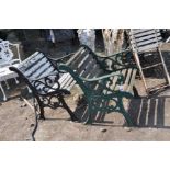 A NEAR PAIR OF MODERN CAST METAL GARDEN CHAIRS, one painted black with white painted slats the other