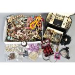 A BLACK JEWELLERY CASE AND BOX OF COSTUME JEWELLERY, the black jewellery case with a yellow metal