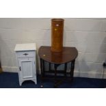 A CYLINDRICAL TURNED HARDWOOD UMBRELLA STAND, together with a mid 20th Century oak gate leg table