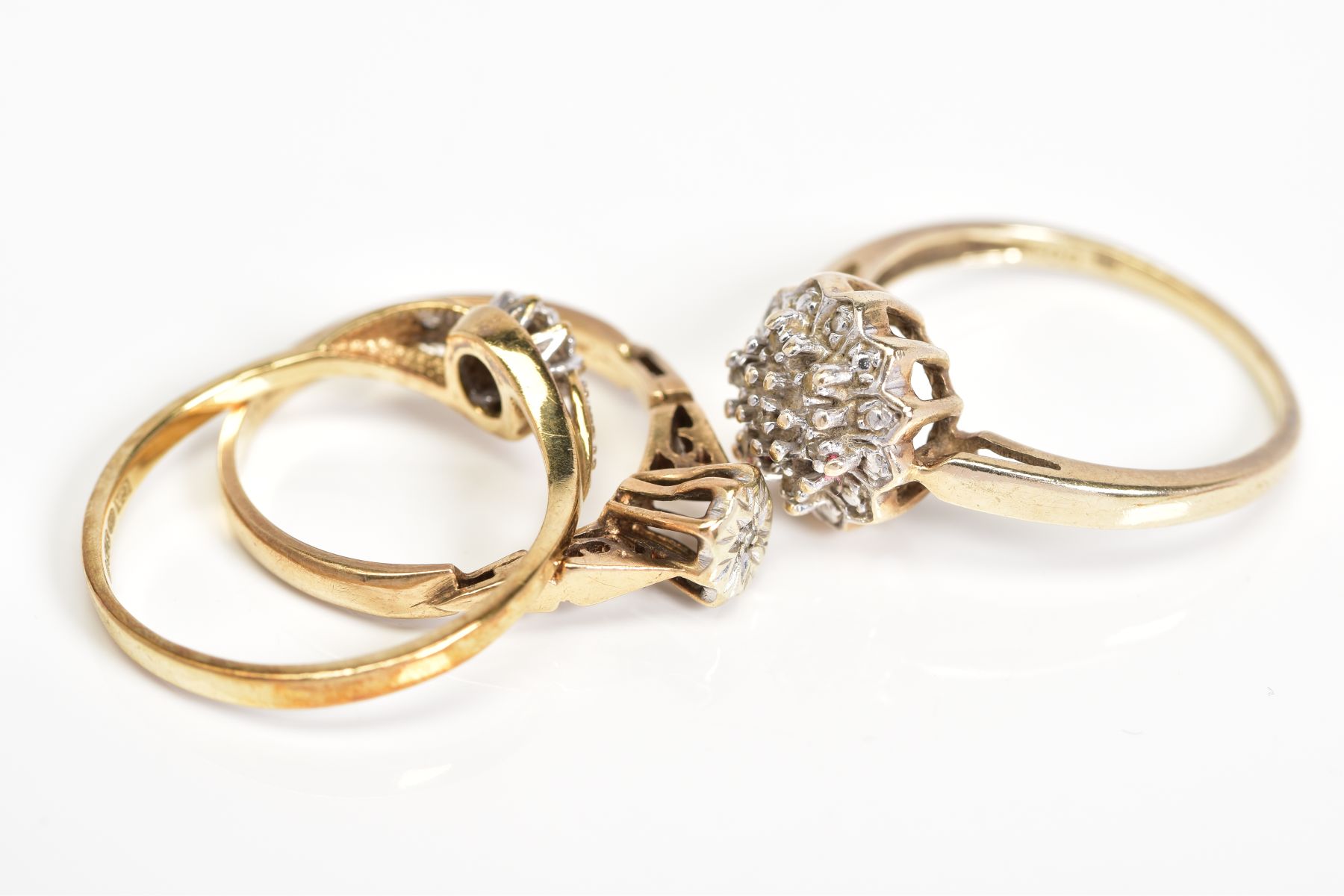 THREE 9CT GOLD DIAMOND SET RINGS, to include a raised single cut diamond cluster ring, stamped - Image 3 of 3