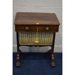 A REGENCY ROSEWOOD WORK TABLE, rectangular top with rounded corners, and brass banding to edge, with