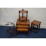 A 1970'S TEAK NEST OF THREE TABLES, together with a wrought iron magazine rack and two occasional