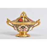 A ROYAL CROWN DERBY IMARI SOLID GOLD BAND TWIN HANDLED OVAL VASE AND COVER, 1128 pattern, date