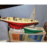 A BOXED TRI-ANG PLASTIC 24'' RACING YACHT, Ocean Cabin Racer 'Osprey', No.404S, contents not checked