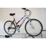 A CARLTON SUPER COURSE GENTS RACING BIKE, with 21'' frame, 25'' wheels, 18 speed and a Raleigh