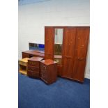 A MODERN MAHOGANY FINISH FOUR PIECE BEDROOM SUITE, comprising two double door wardrobes, dressing