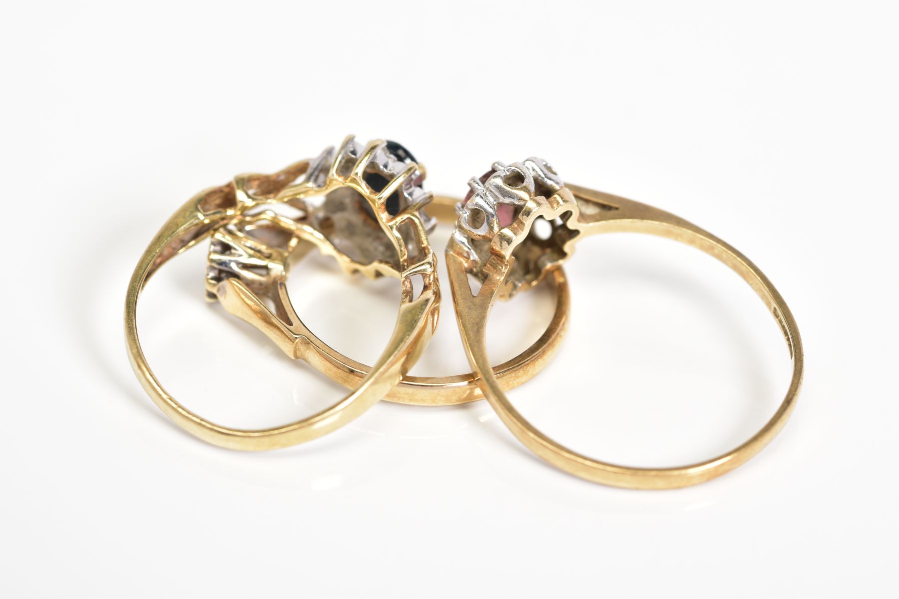 THREE 9CT GOLD RINGS, to include an oval cut sapphire and single cut diamond detail surround, with - Image 3 of 3