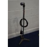 A RESLO VINTAGE RIBBON MICROPHONE standing on a vintage mic stand with tripod cast iron base and a