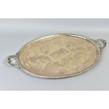 A LATE VICTORIAN SILVER PLATE TWIN HANDLED TRAY OF OVAL FORM, engraved with birds and flowers,