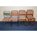 A SET OF NINE MID CENTURY INDUSTRIAL TUBULAR STACKING CHAIRS with fabric back and seats, seven in