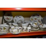A QUANTITY OF ROYAL WORCESTER 'EVESHAM' PATTERN DINNER AND COOKWARE, including eleven dinner plates,