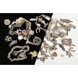 A SMALL SELECTION OF CHARM BRACELETS AND CHARMS, to include a charm bracelet with heart clasp and