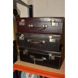 THREE VINTAGE LEATHER COVERED MEDICAL CASES WITH DRAWERS FITTED TO THE INTERIORS, the lid