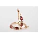 A PAIR OF TOURMALINE AND DIAMOND HOOP EARRINGS, each set with two oval cut reddish/brown tourmalines