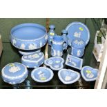 THIRTEEN PIECES OF PALE BLUE WEDGWOOD JASPERWARE, including a pedestal fruit bowl, a pair of