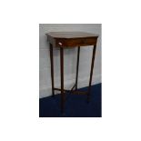 AN EDWARDIAN MAHOGANY AND SATINWOOD BANDED RECTANGULAR WORK SEWING TABLE with canted corners, the