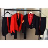 TWO BRITISH ARMY OFFICERS MESS DRESS UNIFORMS, jackets and trousers, one with the insignia of the '